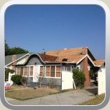 Glendale, CA: After Tearoff Remove 5 Layers of roofing. Install plywood, 30LBS felt.(1/2)